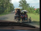 tricycles loaded up with people